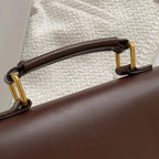 Cartable femme conçu comme sac à main