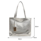 Élégant grand sac à main métallisé façon croco