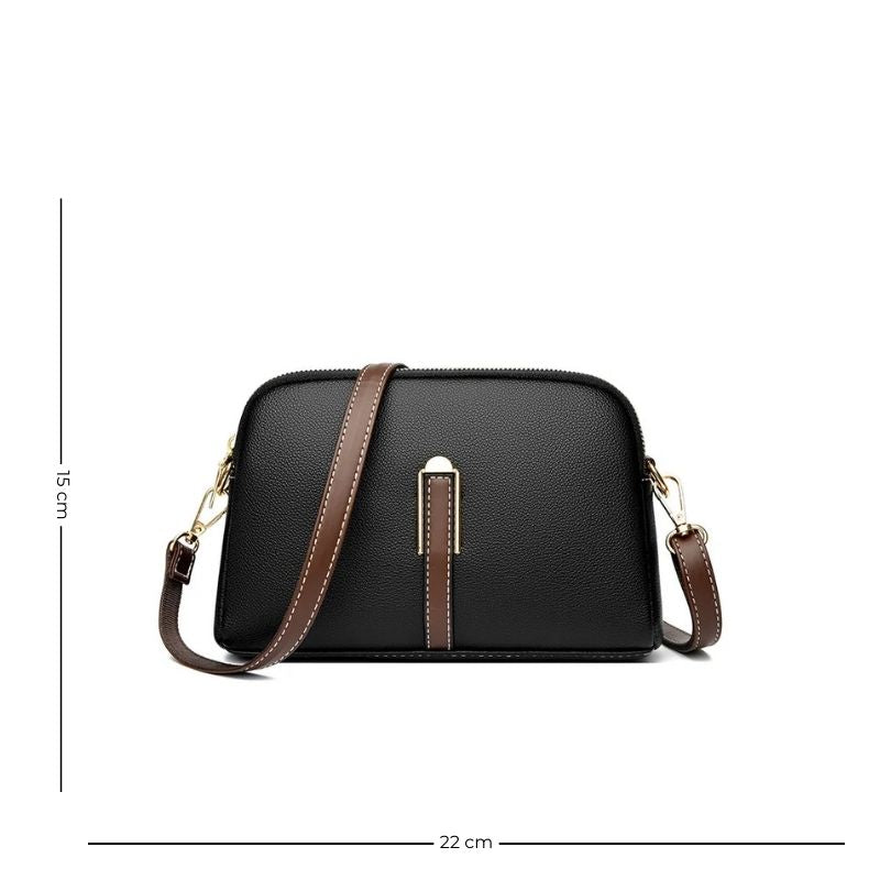 Élégant sac à main noir au design avec bandoulière