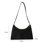 Élégant sac à main noir de forme baguette en simili