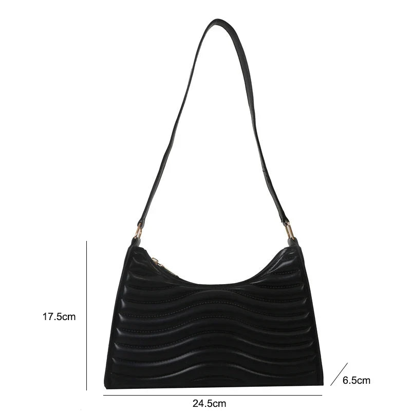 Élégant sac à main noir de forme baguette en simili