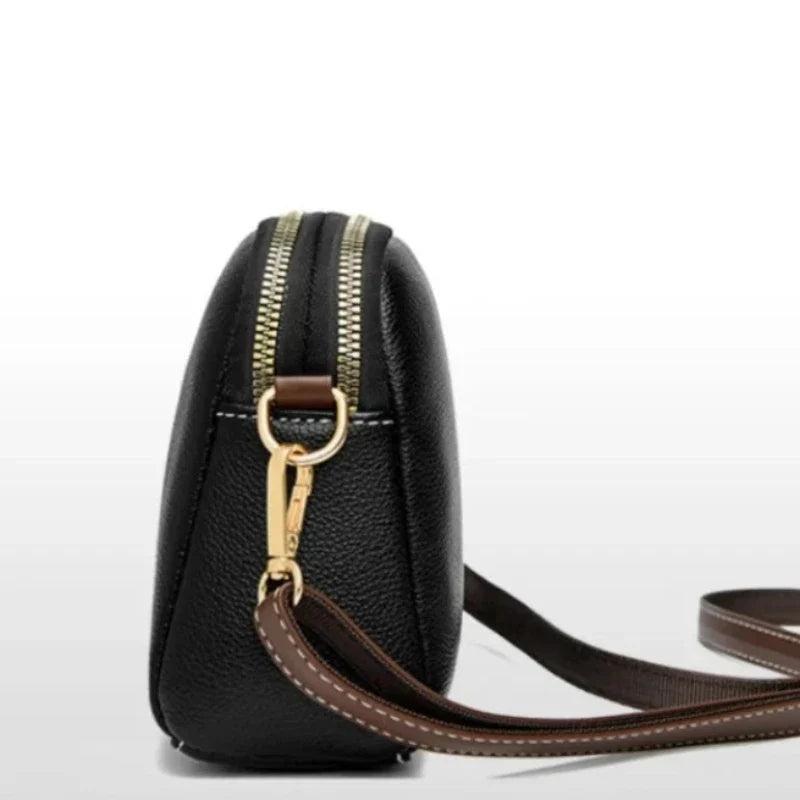 Élégant sac bandoulière noir au design soigné