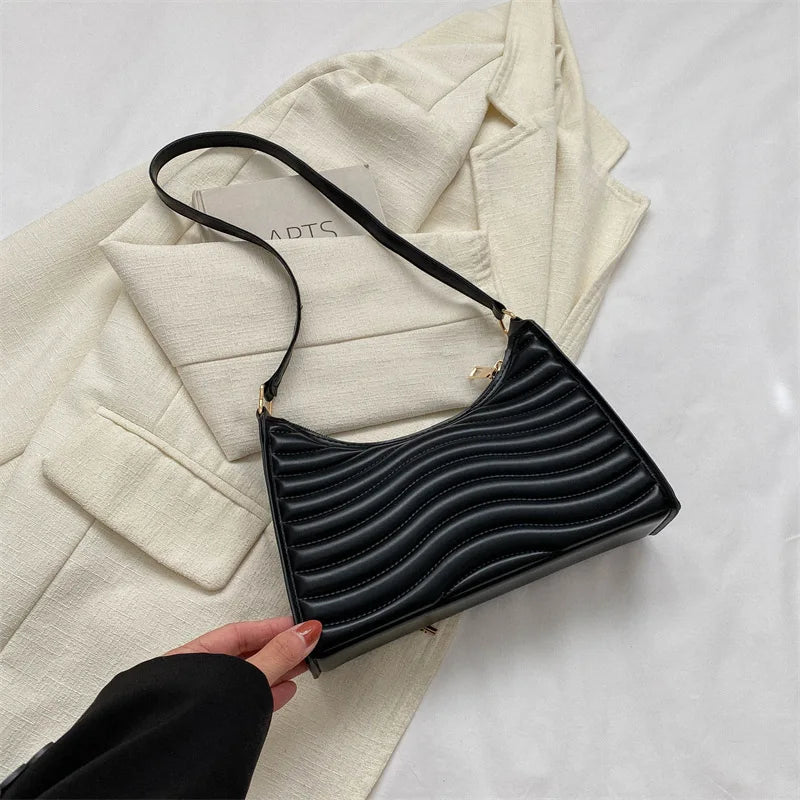Élégant sac en simili noir façon baguette à main
