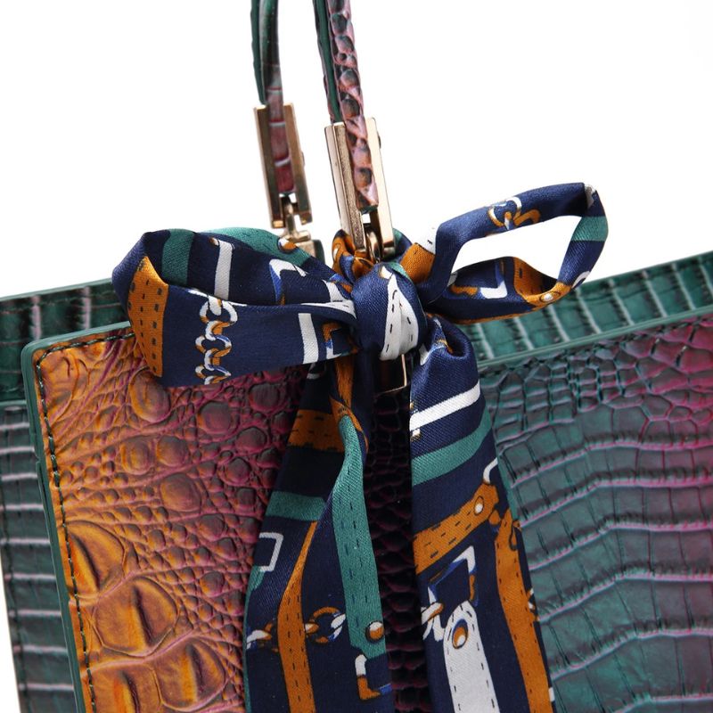 Lot design de trois sacs à main effet crocodile