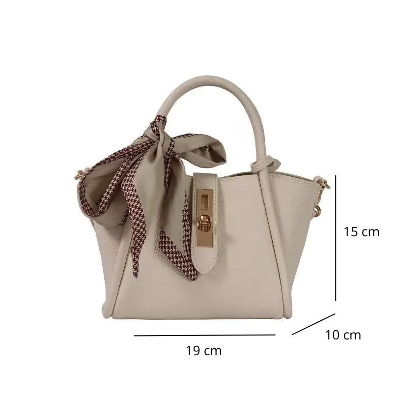 Petit sac à main beige orné d’un foulard