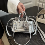 Petit sac à main éclatant et luxueux