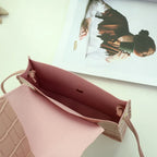 Petit sac bandoulière avec rabat à porter à la main