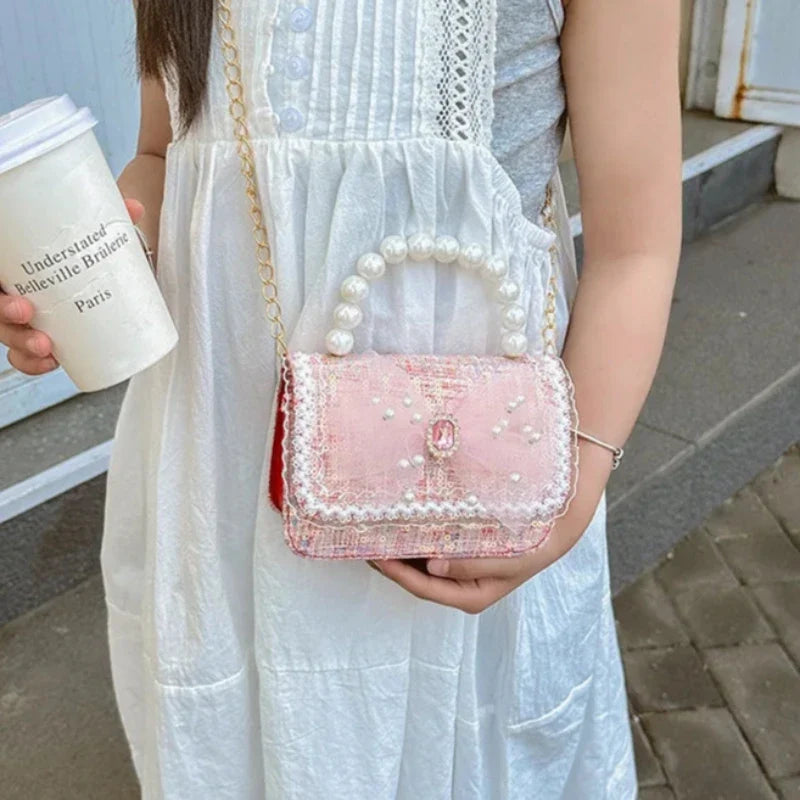 Petit sac fille orné de perles et paillettes