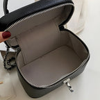 Petite boîte avec sangle bandoulière