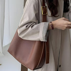 Pochette accompagnant le sac à main