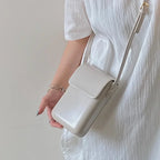 Pochette avec bandoulière destinée aux femmes