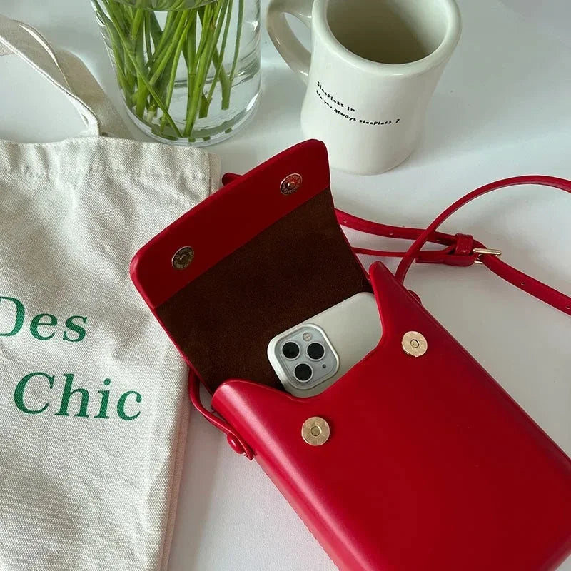 Pochette bandoulière au féminin