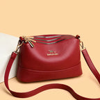 Pochette féminine petit format à porter à la main