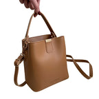 Sac à bandoulière chic au format seau pour femme