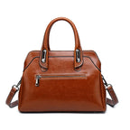 Sac à bandoulière en cuir porté main