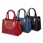 Sac à bandoulière glamour conçu en cuir effet croco