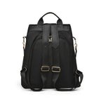 Sac à dos noir en toile orné de paillettes