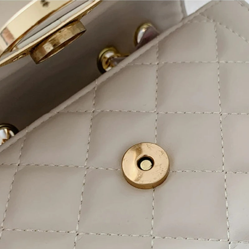 Sac à main à perles effet matelassé