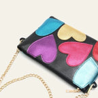 Sac à main aux teintes multicolores et motifs cœur