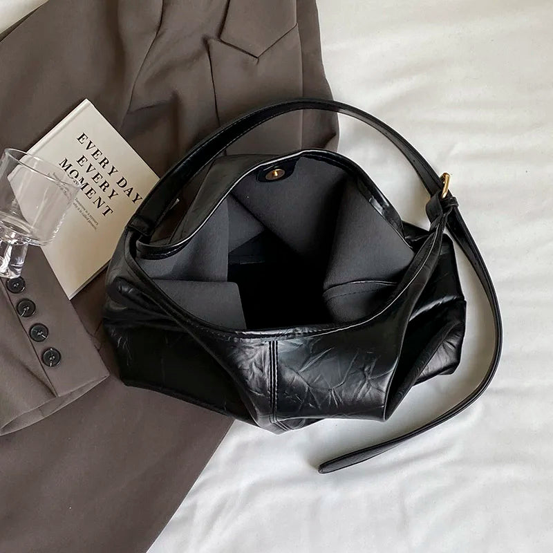 Sac à main avec bandoulière, souple et tendance
