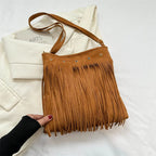 Sac à main bohème chic doté d’une frange stylée