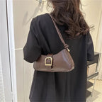 Sac à main chic en simili de forme baguette avec boucle métallique