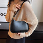 Sac à main compact forme baguette