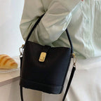Sac à main de forme seau avec bandoulière