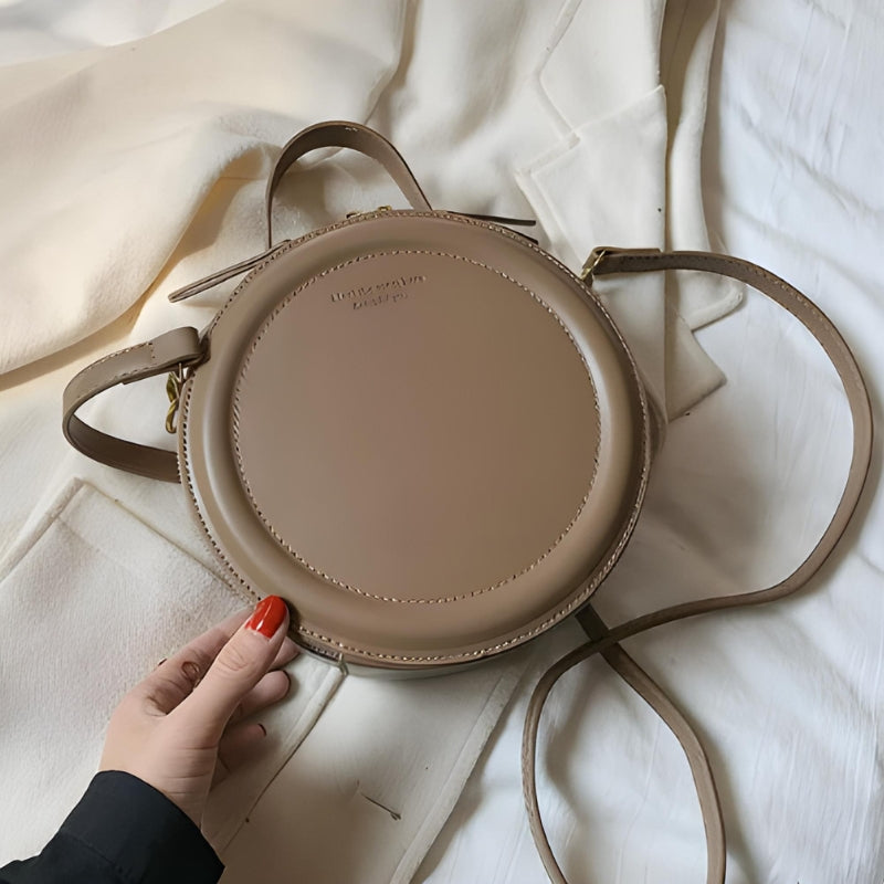 Sac à main distinctif de forme ronde