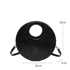 Sac à main effet crocodile de forme ronde