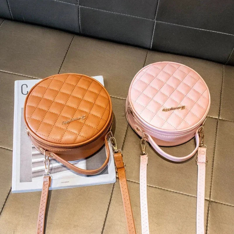Sac à main effet matelassé au design rond