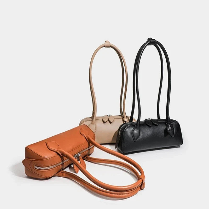 Sac à main élégant de forme baguette avec anse chic