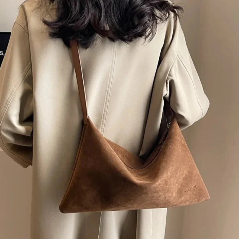 Sac à main élégant façon baguette minimaliste