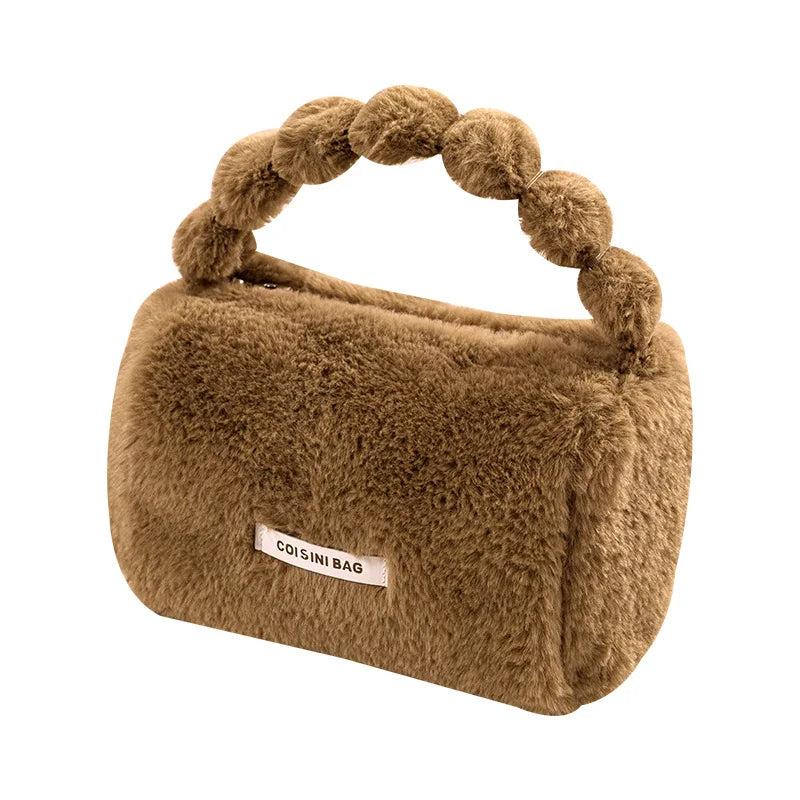 Sac à main en fourrure synthétique de format fourre-tout