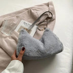 Sac à main en fourrure synthétique douce grise