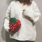 Sac à main évoquant une fraise