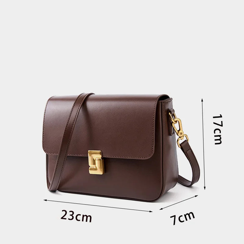 Sac à main féminin marron en cuir porté bandoulière