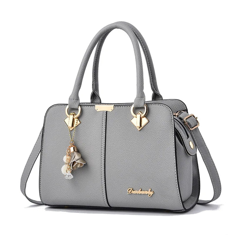 Sac à main femme avec breloque