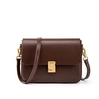 Sac à main marron en cuir avec bandoulière pour femme