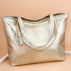 Sac à main métallisé grand et élégant effet croco