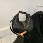Sac à main raffiné avec design baguette tressé