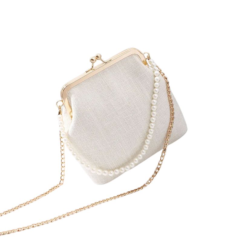 Sac à main raffiné avec poignée composée de perles