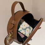 Sac à main rond au design original