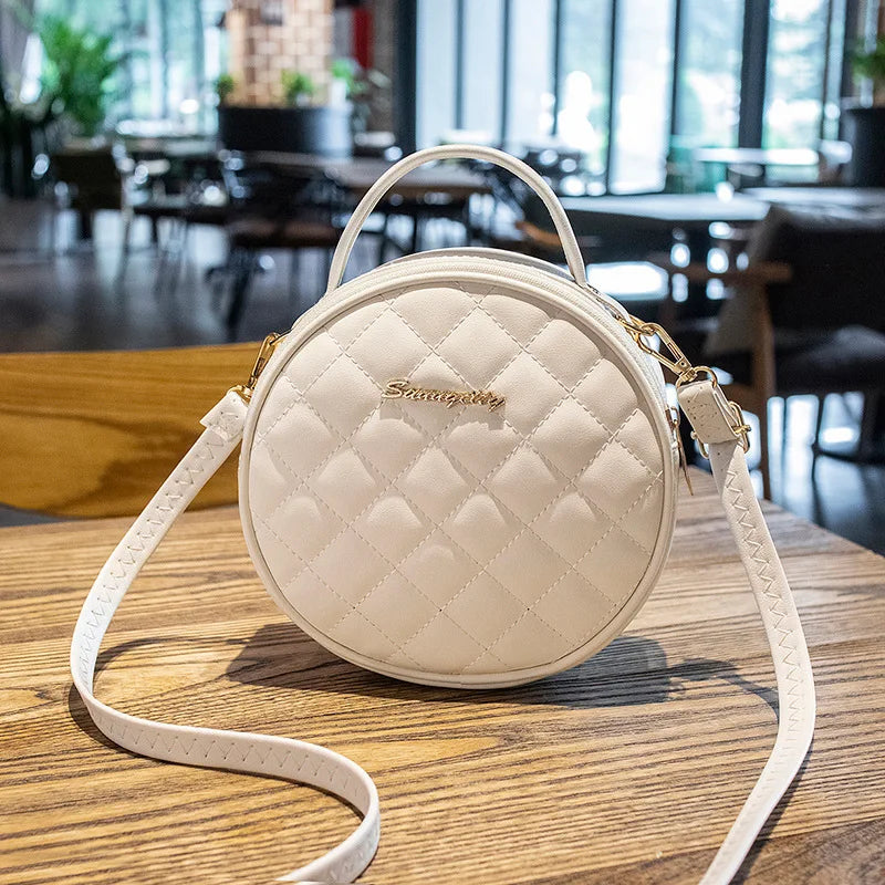 Sac à main rond au rendu matelassé