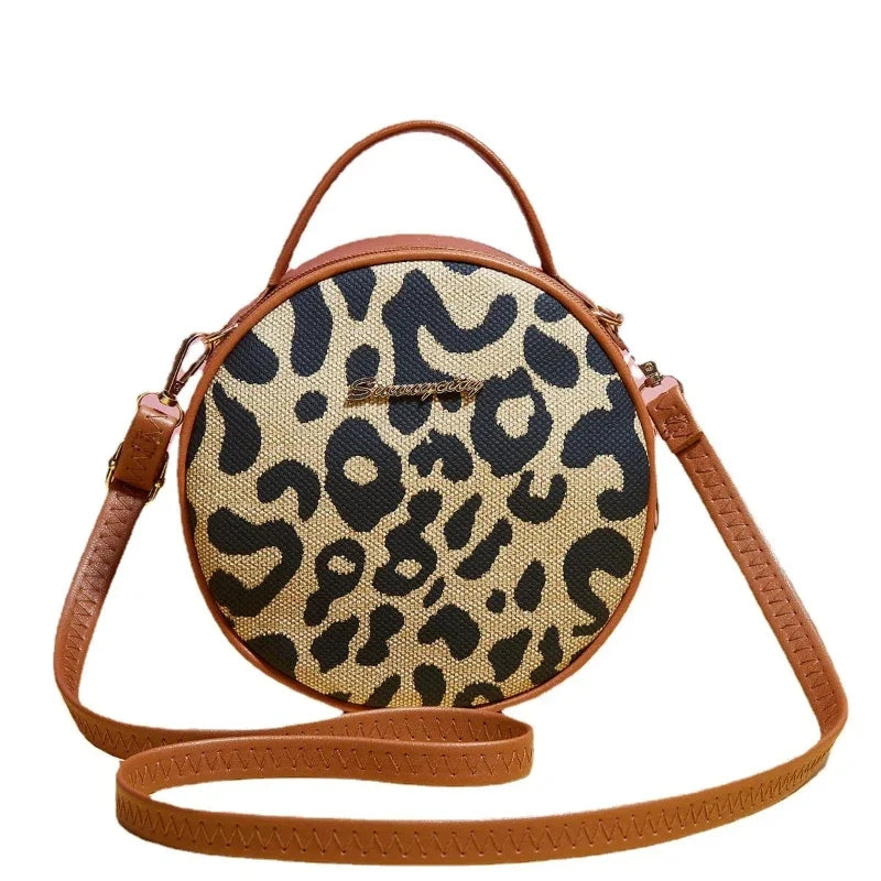 Sac à main rond bandoulière motif léopard
