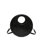 Sac à main rond effet crocodile