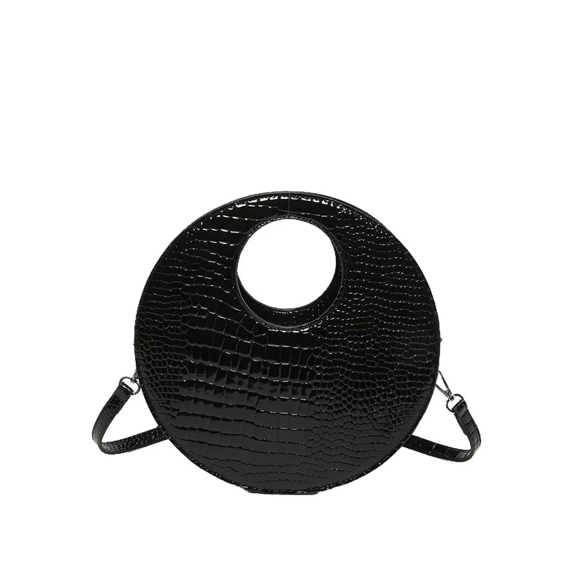 Sac à main rond effet crocodile