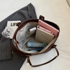 Sac à main spacieux de type cabas, style sobre