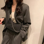 Sac à main tendance noir et imperméable