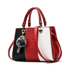 Sac à main verni motif croco